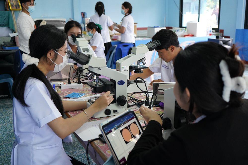Allied Health Sciences students conducting blood testing at community health outreach