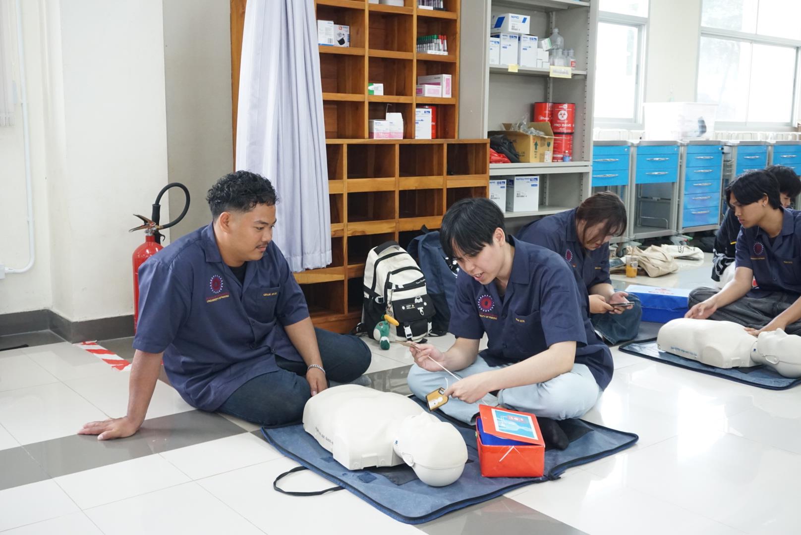 Basic First Aid Training session with hands-on CPR practice