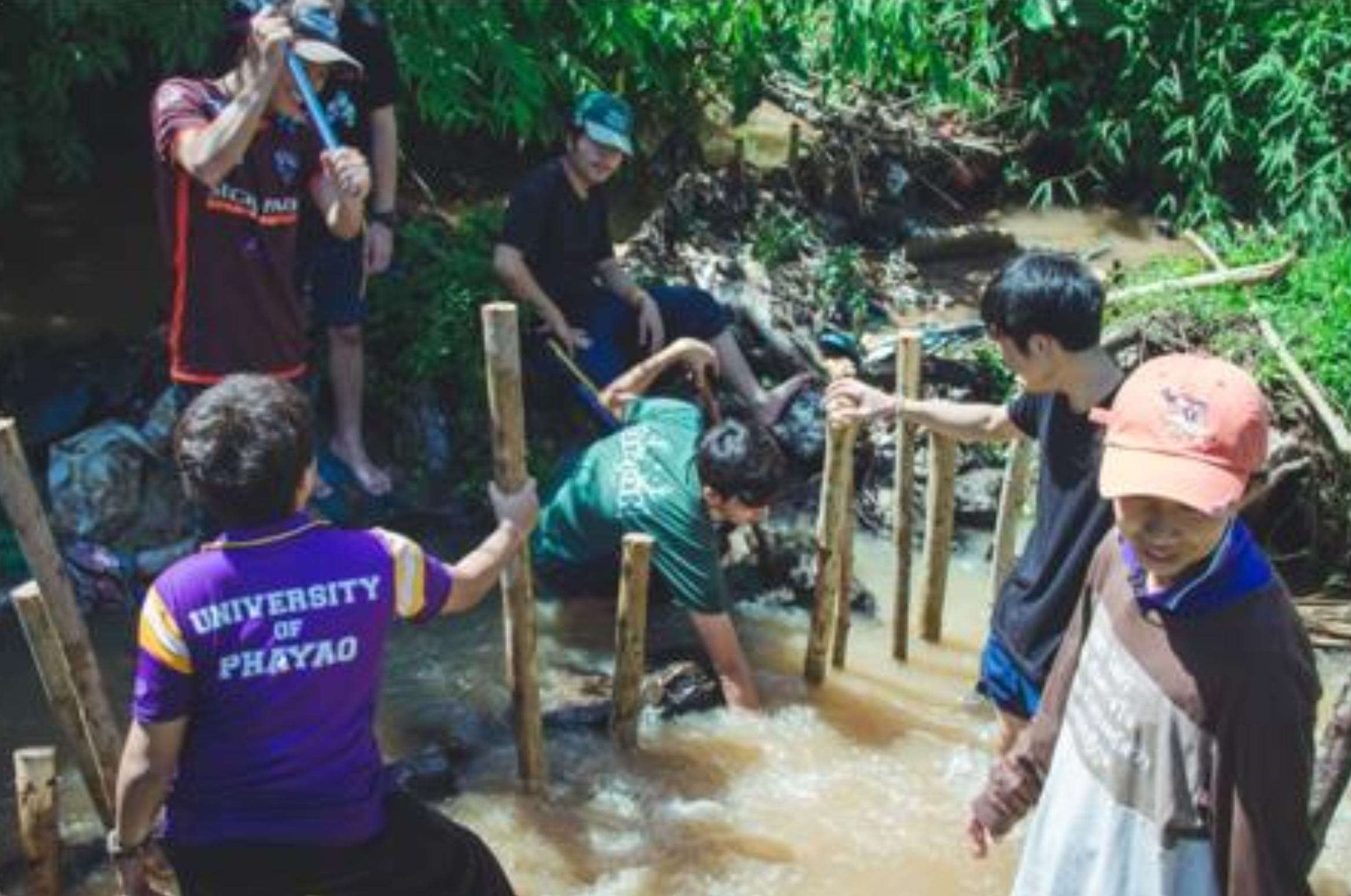 University of Phayao students and community members constructing check dams for watershed conservation