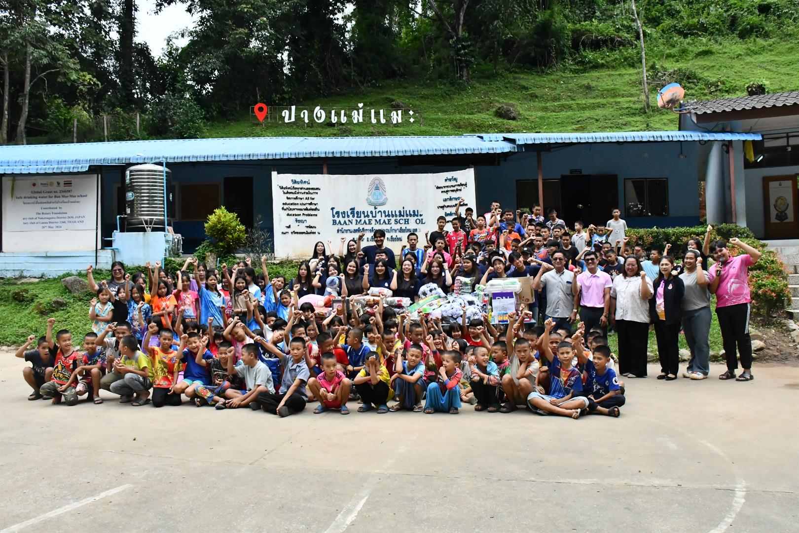 Students constructing a check dam at Ban Mae Mae School