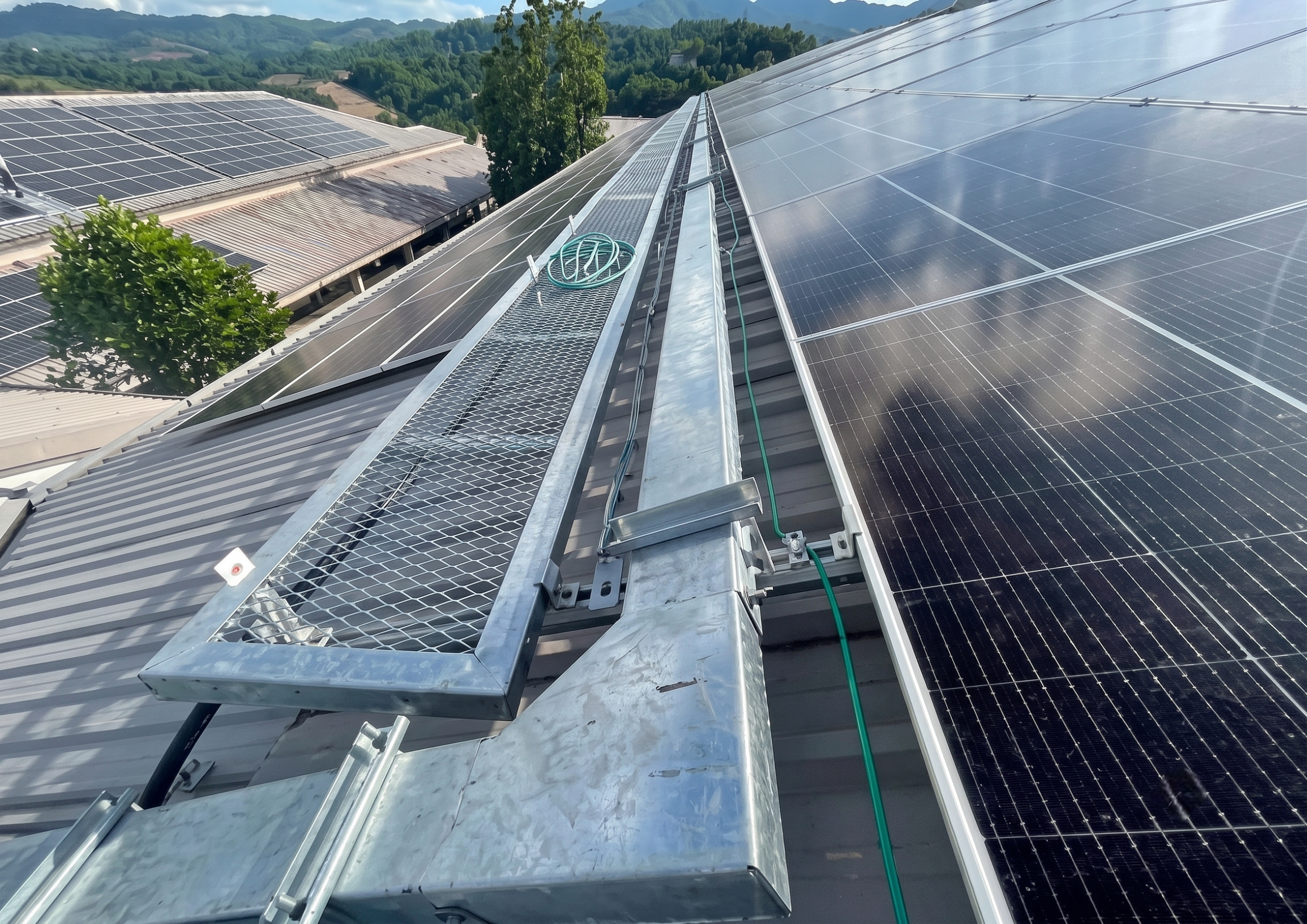Meteorological monitoring mast on rooftop solar installation