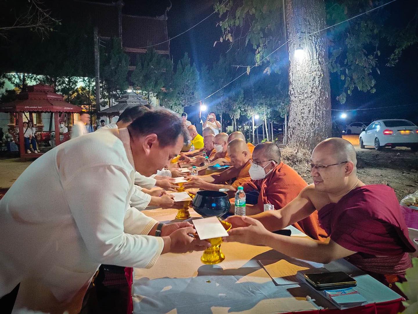 Nighttime alms preparation for the Peng Pud Midnight Alms Walking Ceremony 2025