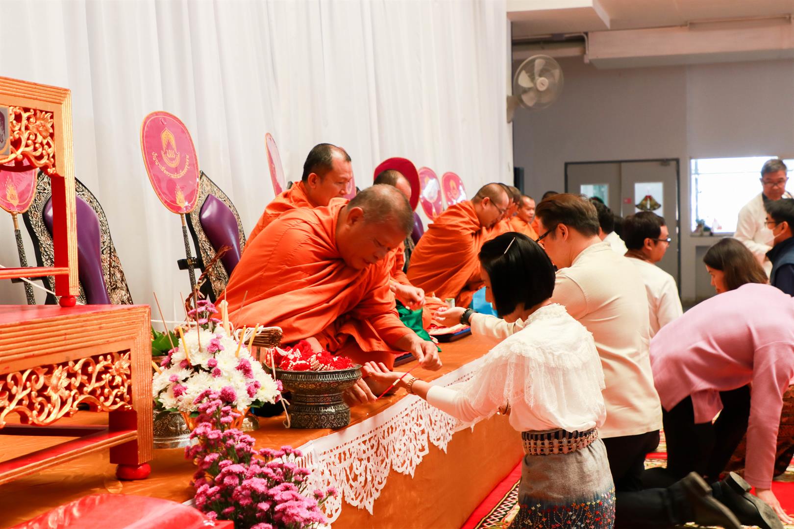 Monks blessing attendees at the New Year Merit-Making Ceremony 2025