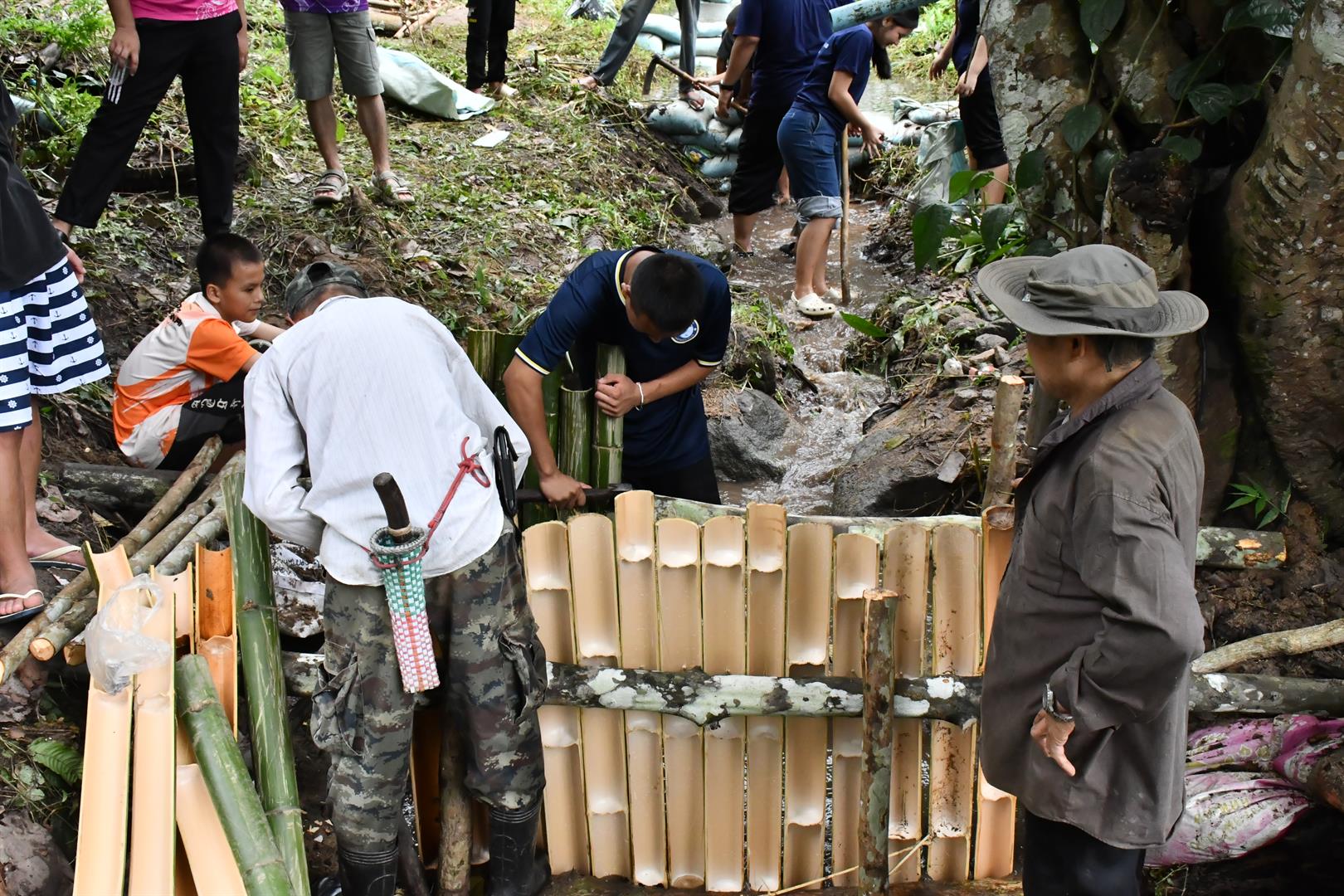 Students constructing a check dam at Ban Mae Mae School